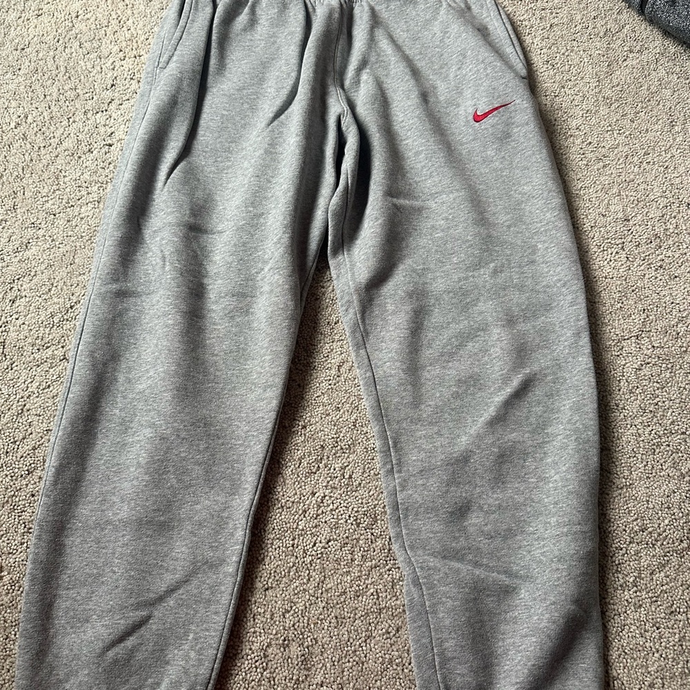 Nike women’s Gray Joggers with Red Logo
